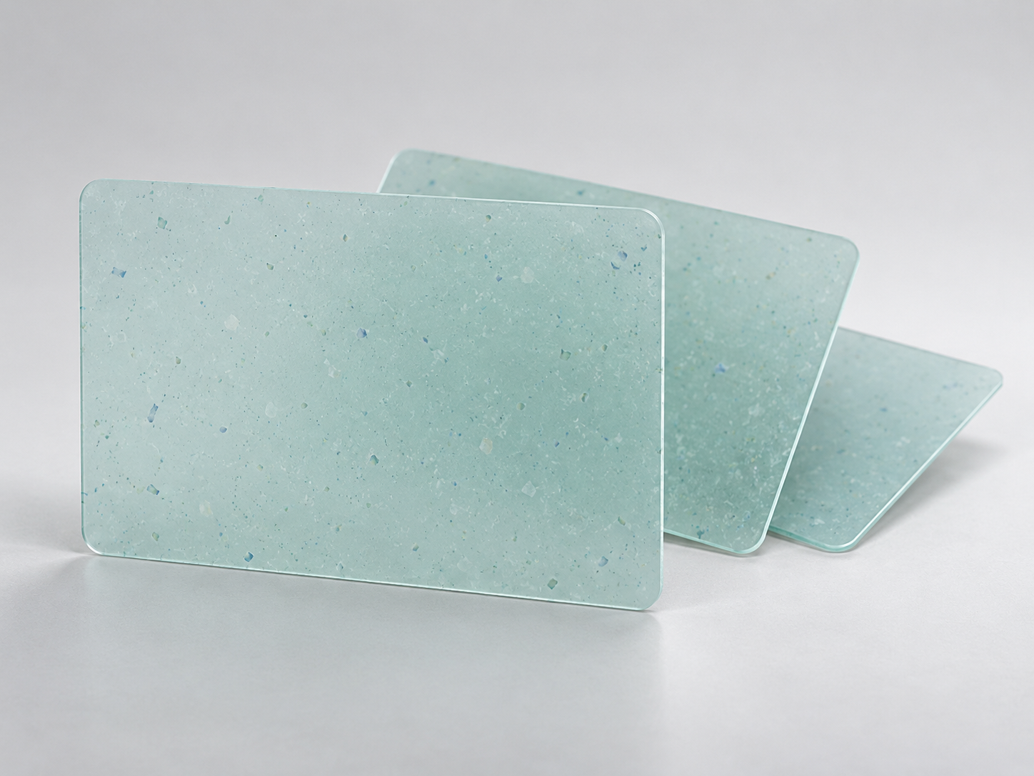 Translucent pale-aqua PET plastic cards